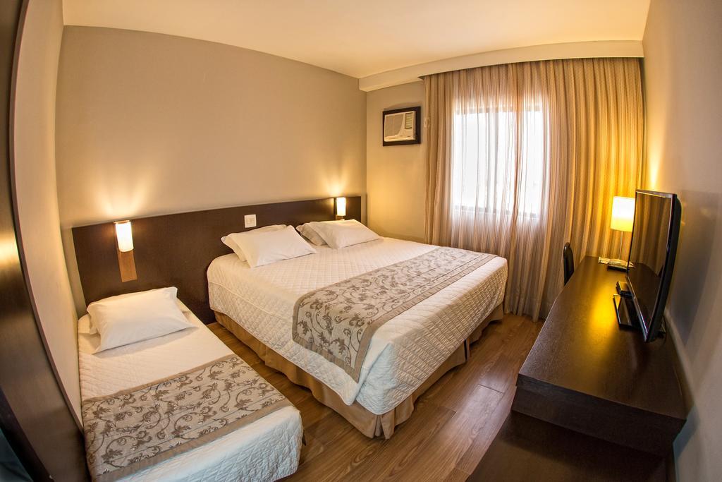 Quarto Triplo Executivo